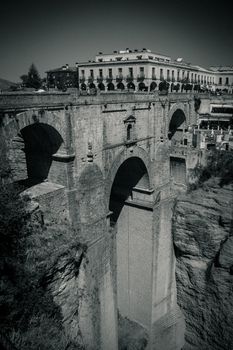 A gorge in the city of Ronda Spain, Europe on a hot summer day with clear blue skies