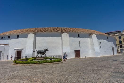 A bull fighting ring in the city of Ronda Spain, Europe on a bright summer day with clear blue skies