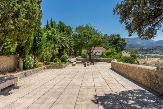 The walking path on Tajo De Ronda in the city of Ronda Spain, Europe on a hot summer day