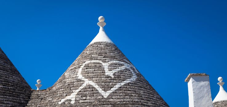 Alberobello, Puglia Region, South of Italy. Traditional roofs of the Trulli, original and old houses of this region.