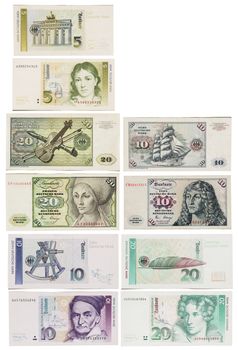 Obsolete German bank notes isolated on a white background.