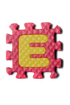 Foam puzzle letter uppercase isolated on a white background.