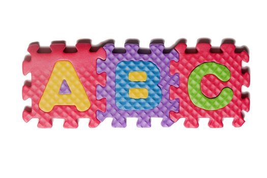 Foam puzzle letter uppercase isolated on a white background.