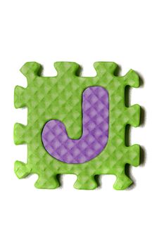 Foam puzzle letter uppercase isolated on a white background.