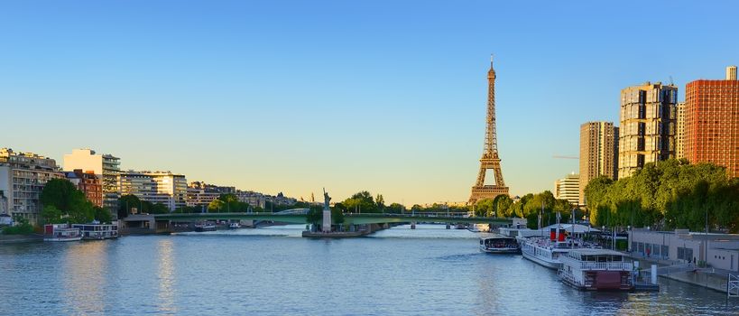 Modern district of skyscrapers on Seine with view on Eiffel Tower in Paris, France