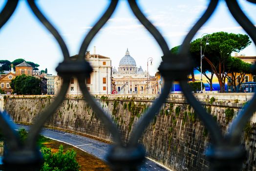 Italy, Rome, City of the Vatican dome of San Pietro seen from the bridge over the Tiber River