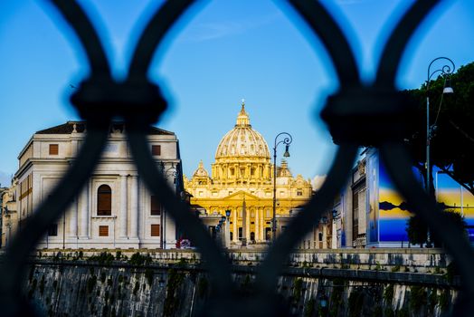 Italy, Rome, City of the Vatican dome of San Pietro seen from the bridge over the Tiber River