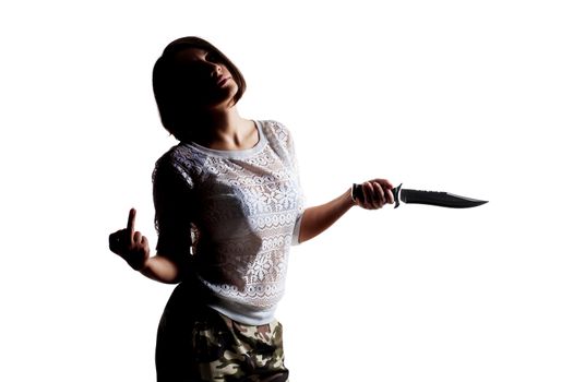 half silhouette girl with army knife and middle finger up