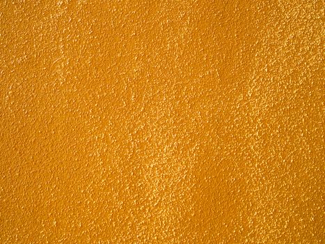 close up of coarse orange wall texture background