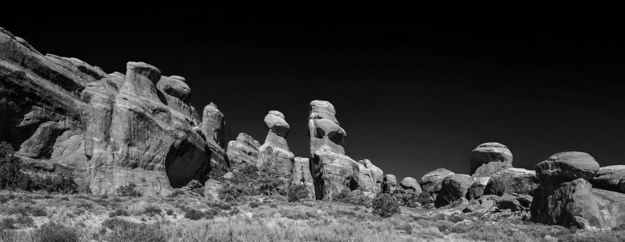 A monochrome image of interesting rock formations in Arches National Park, Utah