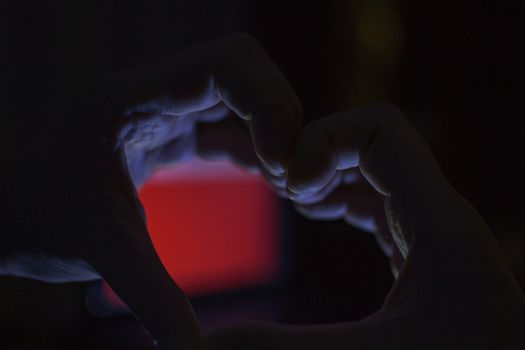 hands heart Valentines day image of the hands in the dark for the holiday