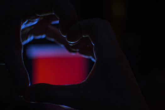 hands heart Valentines day image of the hands in the dark for the holiday