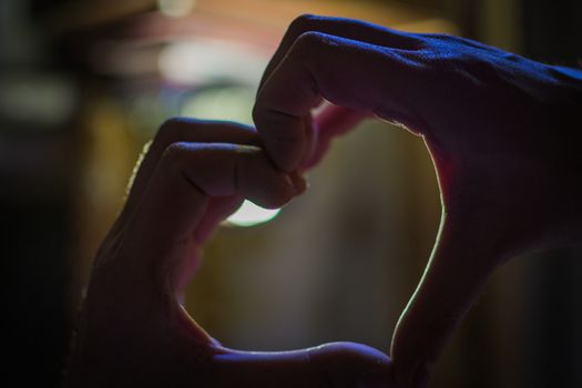 hands heart Valentines day image of the hands in the dark for the holiday