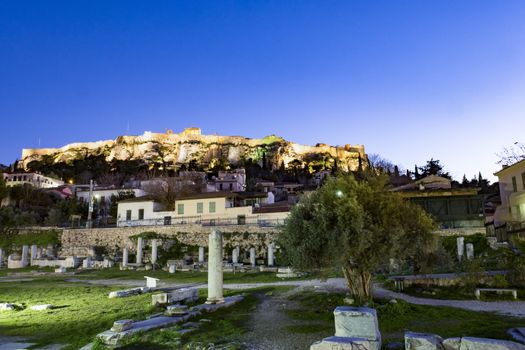 view of roman market and acropolis above