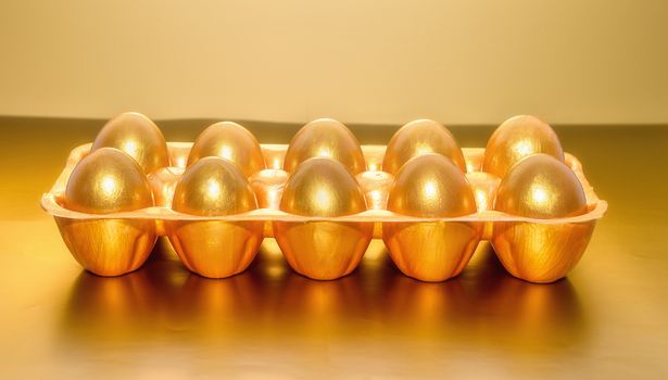 A tray of golden eggs, the concept of financial success.