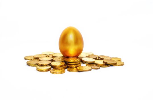 Gold coins and golden eggs, the concept of financial growth.