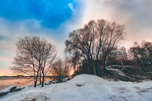 Cold winter snowy landscape at middle of the day