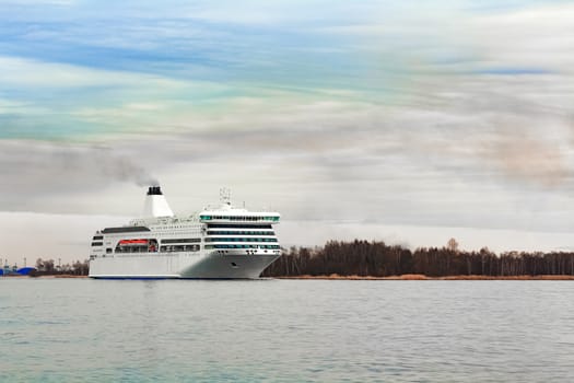 White cruise liner sailing on a clear day