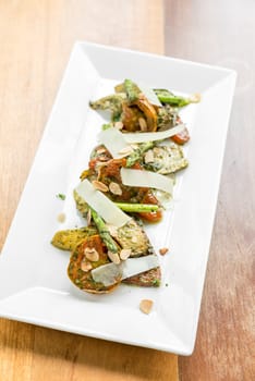 Grilled vegetables with Pestro Sauce omwooden table