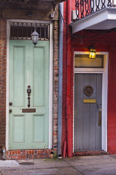 two old wood door from two different building from the french quarter in New Orleans