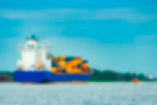 Cargo ship - soft lens bokeh image. Defocused background