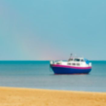 Blue passenger ship - soft lens bokeh image. Defocused background