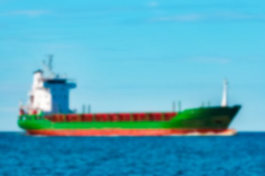 Cargo ship - soft lens bokeh image. Defocused background