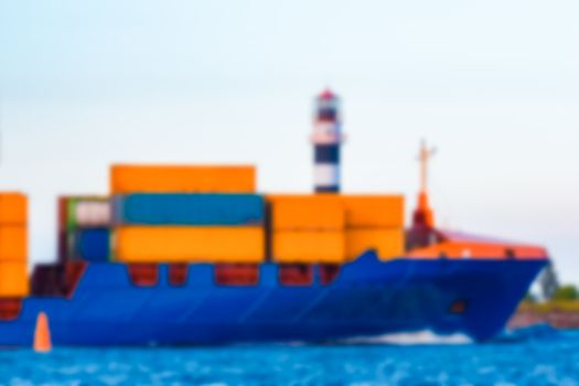 Blue cargo ship - soft lens bokeh image. Defocused background