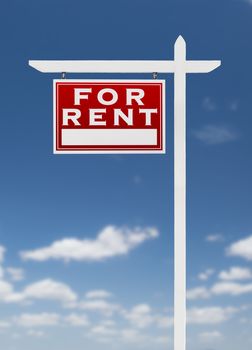 Left Facing For Rent Real Estate Sign on a Blue Sky with Clouds.