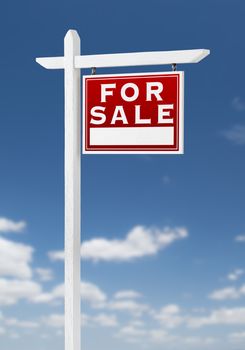 Right Facing For Sale Real Estate Sign on a Blue Sky with Clouds.