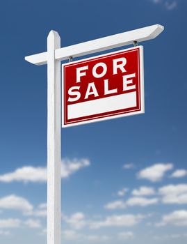 Right Facing For Sale Real Estate Sign on a Blue Sky with Clouds.