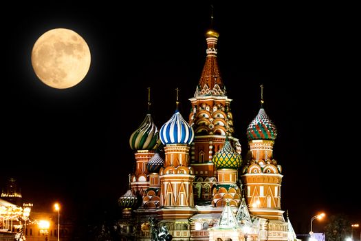 St Basils Cathedral at night and full Moon. Winter season. Moscow, Russia