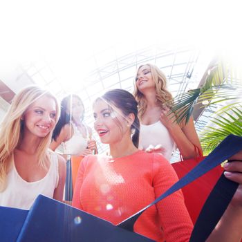 beautiful young women shopping at mall