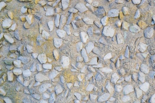 the texture of the stone in plaster red stones on a white background