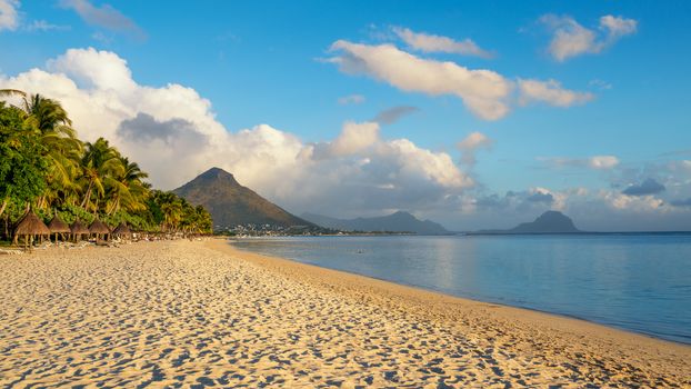 Flic and flac beach in the sunny day,Nice view of mountains, Mauritius island.