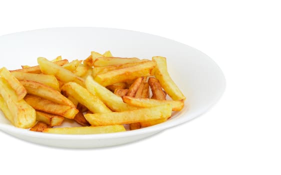 Fragment of the white dish with a serving of the French fries on a light background
