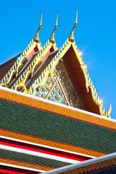 Detail of architecture at Famous Wat Arun (The Temple of  Dawn) temple in Bangkok, Thailand. The shelter of this temple is regarded as one of the most beautiful in Thailand.