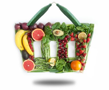 Fruits and vegetables in the shape of a grocery basket 