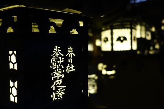 Lanterns lighting in the dark, Kasuga-Taisha Shrine temple, Nara, Japan