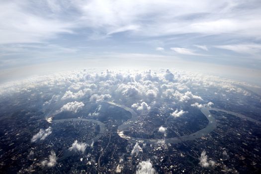 Aerial overview Bangkok cityscape.Town scenery above the clouds