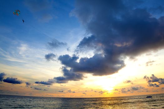 Sunset seascape.Beach and water sports.