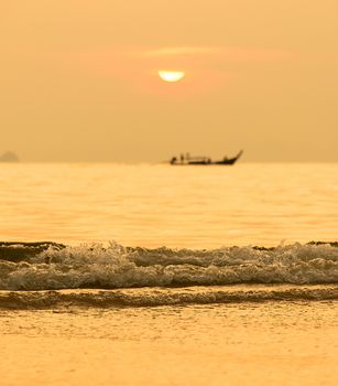 Sunset In Thailand With Sea And Longtail Boat