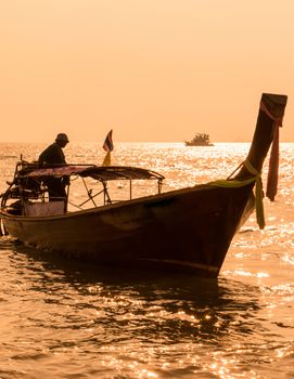 Long Tail Boat In Phuket Thailand During Sunset