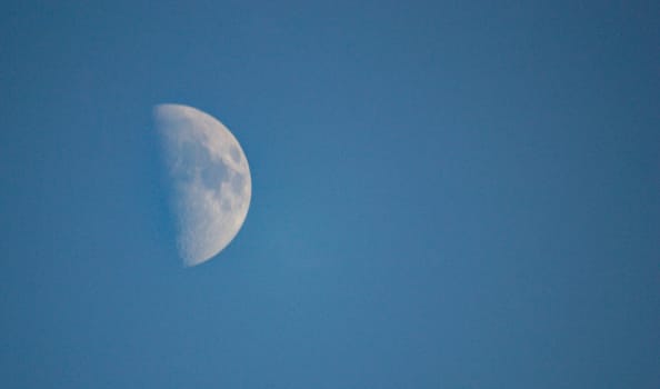 Paul moon blue sky daytime in the winter