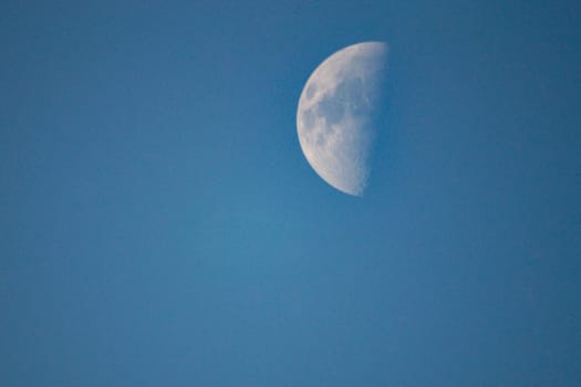 Paul moon blue sky daytime in the winter