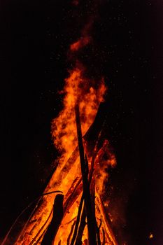 Great bright fire at a celebration in the Ukrainian village. Ukraine 2017 years