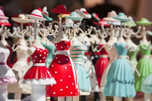 Colorful hanging doll souvenirs in a market