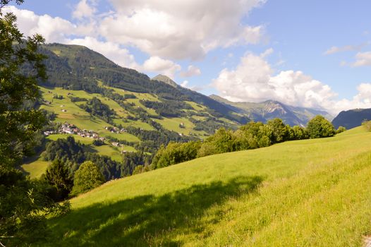 View of a valley and green hills in the Austrian Tyrol