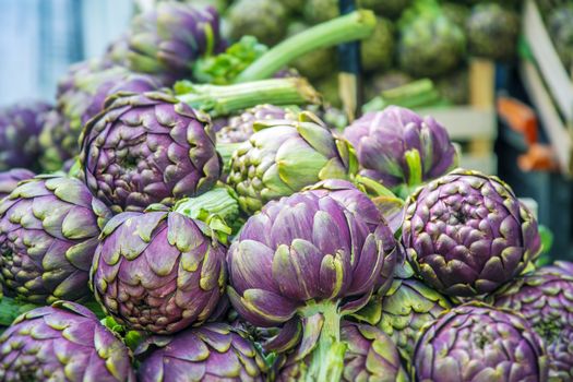 Group of artichokes in a market stall