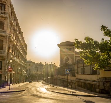 city center of Granada, Spain, Europe during golden hour of sunset on a bright sunny day